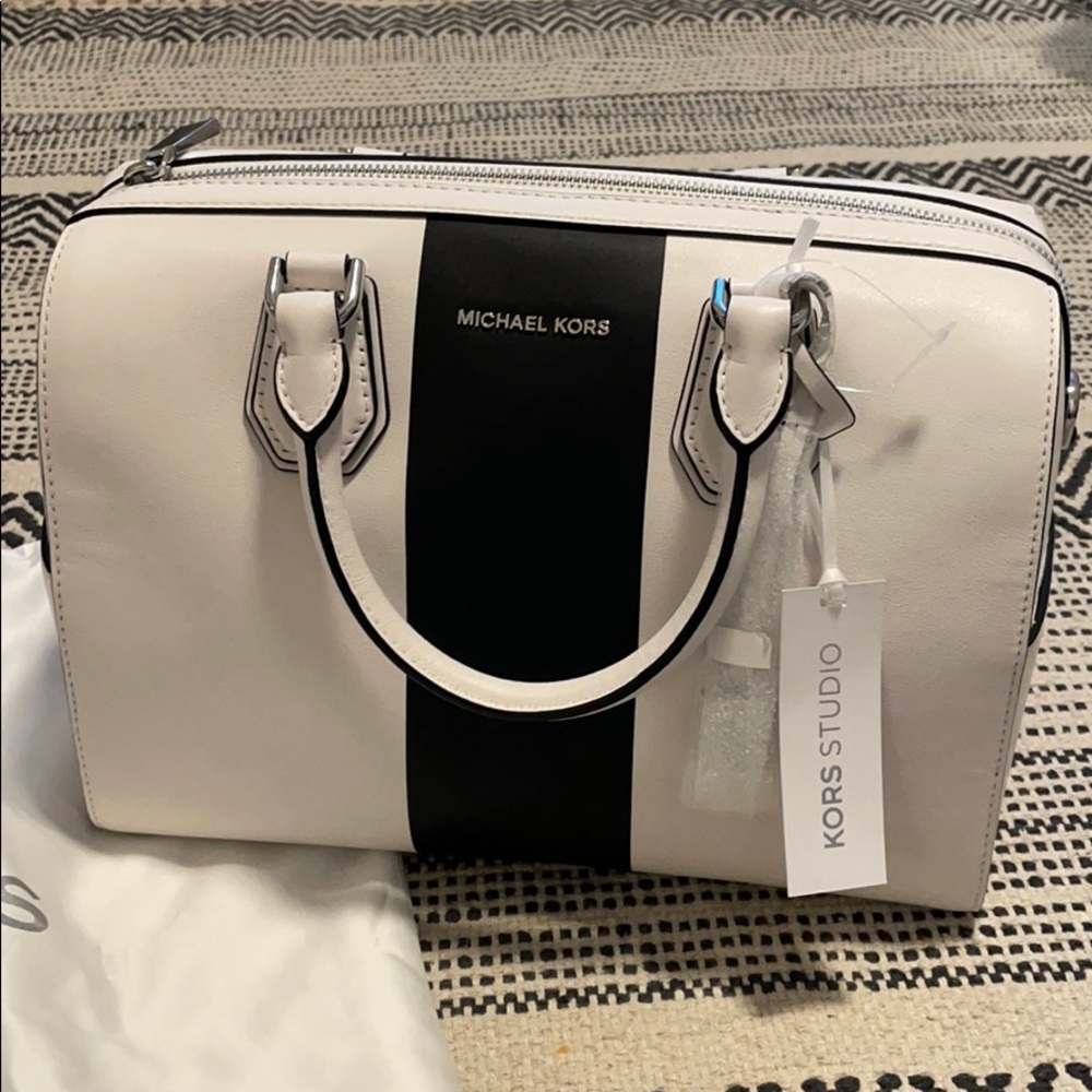 Michael Kore Center Stripe leather duffle